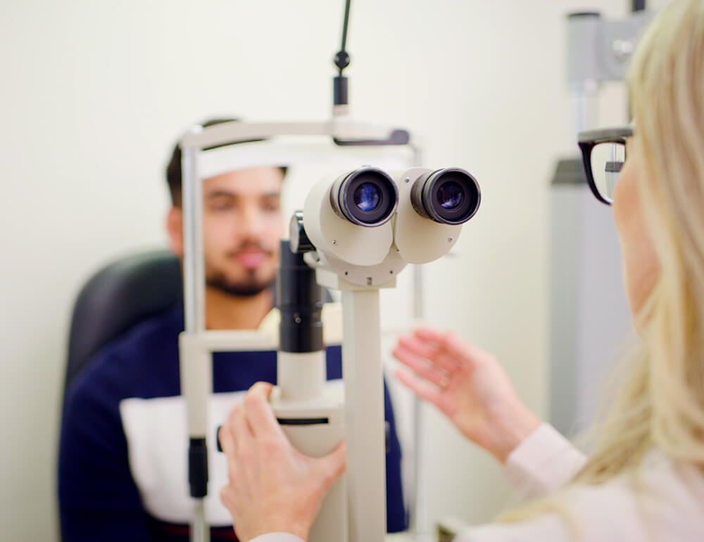 Doctor examining a patient's eyes