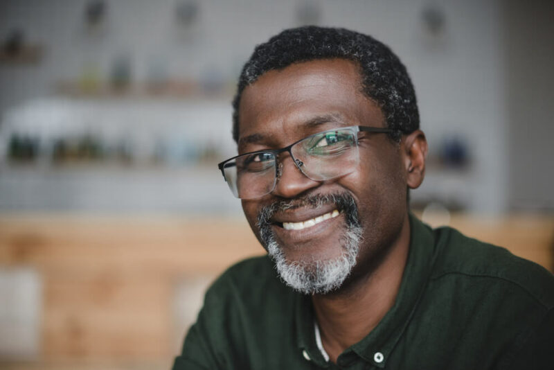 close-up portrait of smiling mature man in