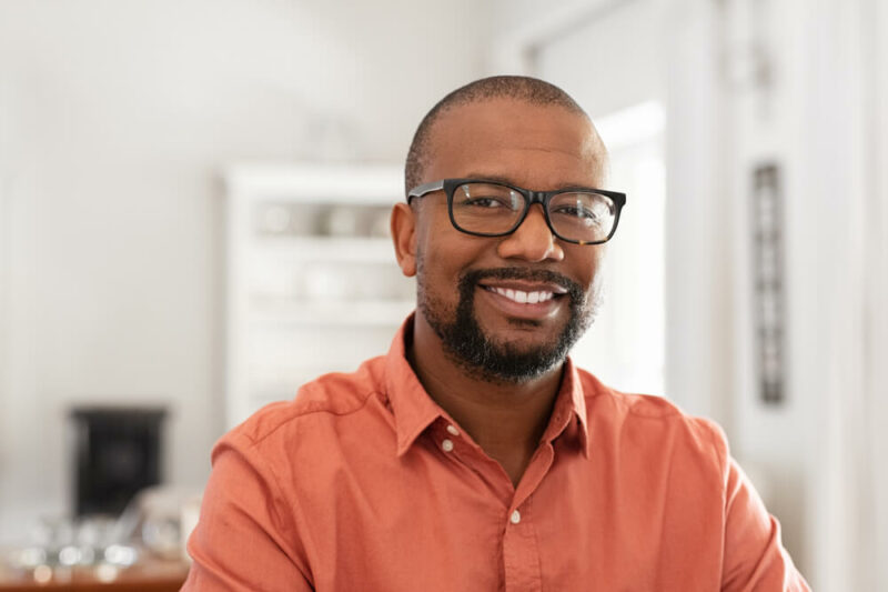 Smiling man with glasses